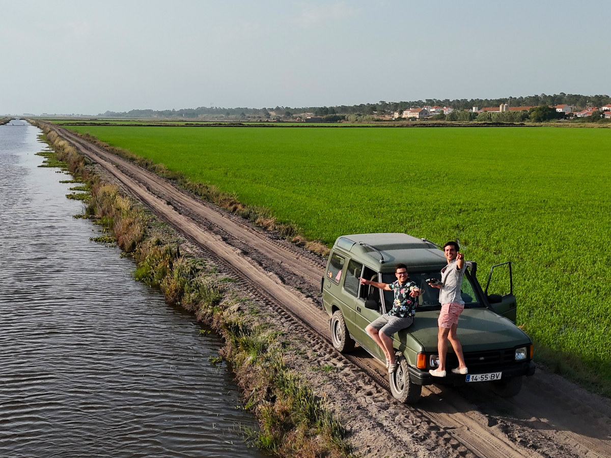 Guests with the Land Rover at golden hour